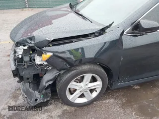 2012 Toyota Camry L z VIN 4T1BF1FK2CU144714, wystawiony jako IAAI lot #41867511 z przebiegiem 152 642 mil mil oraz . Historia ofert i sprzedaży dostępna na DreamBid. Obrazek 18.