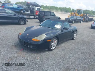 2002 Porsche Boxster S z VIN WP0CB29842U663272, wystawiony jako IAAI lot #42604562 z przebiegiem 68 927 mil mil oraz . Historia ofert i sprzedaży dostępna na DreamBid. Obrazek 2.