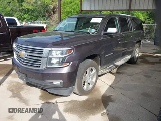 2015 Chevrolet Suburban LTZ with VIN 1GNSCKKC7FR272138, listed as a IAAI auction lot 42047823 with 198,314 mi miles and . Bid and sale history available at DreamBid. Image 18.