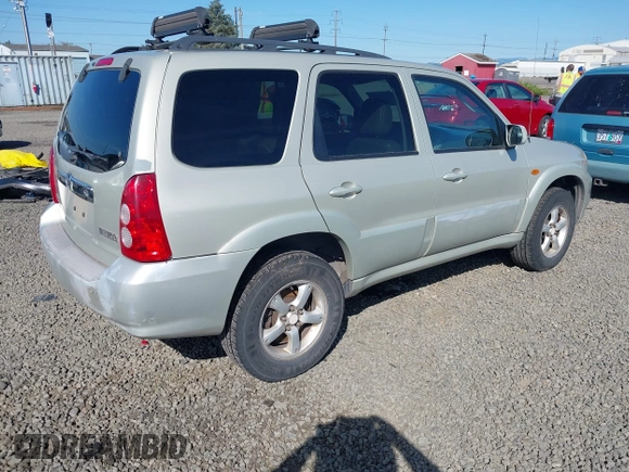 2005 Mazda Tribute S with VIN 4F2CZ96105KM04032, listed as a IAAI auction lot 42157429 with 199,704 mi miles and . Bid and sale history available at carsss.com. Image 4.