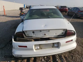 1997 Oldsmobile Aurora z VIN 1G3GR62CXV4124968, wystawiony jako Copart lot #69615474 z przebiegiem 249 895 mil mil oraz Nie do naprawy. Historia ofert i sprzedaży dostępna na DreamBid. Obrazek 6.