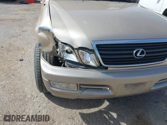 2000 Lexus LX 470 with VIN JT6HT00W0Y0098917, listed as a IAAI auction lot 41937661 with 180,980 mi miles and . Bid and sale history available at DreamBid. Image 6.