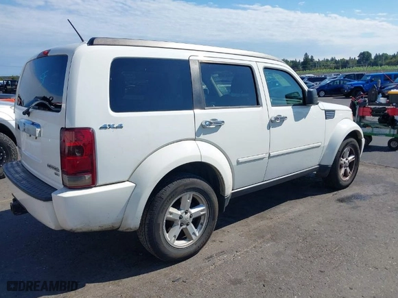 2010 Dodge Nitro SXT with VIN 1D4PU5GK3AW115958, listed as a IAAI auction lot 40357456 with 162,548 mi miles. Bid and sale history available at carsss.com. Image 4.