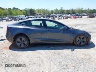 2023 Tesla Model 3 z VIN 5YJ3E1EA0PF655244, wystawiony jako IAAI lot #42004592 z przebiegiem 54 860 mil mil oraz . Historia ofert i sprzedaży dostępna na DreamBid. Obrazek 12.
