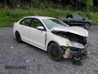 2011 Volkswagen Jetta SE with VIN 3VWDX7AJ3BM320522, listed as a Copart auction lot 60617095 with 164,863 mi miles and Salvage title. Bid and sale history available at DreamBid. Image 4.