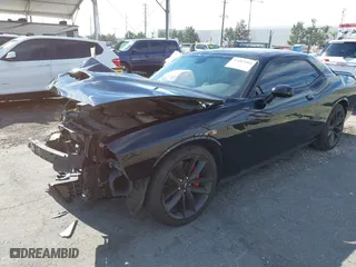 2020 Dodge Challenger GT with VIN 2C3CDZJG0LH159512, listed as a IAAI auction lot 41482999 with 131,520 mi miles. Bid and sale history available at carsss.com. Image 2.