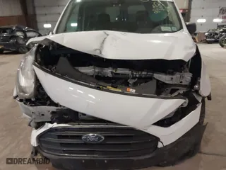 2019 Ford Transit Connect Van XL with VIN NM0LS6E25K1425678, listed as a IAAI auction lot 41287172 with 99,130 mi miles. Bid and sale history available at carsss.com. Image 6.