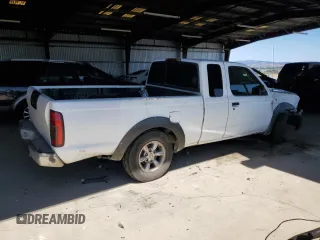 2002 Nissan Frontier XE with VIN 1N6DD26S02C309301, listed as a Copart auction lot 64142805 with 237,523 mi miles and Salvage title. Bid and sale history available at DreamBid. Image 3.