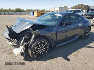 2023 Toyota GR86 with VIN JF1ZNBB1XP9762984, listed as a Copart auction lot 74261064 with 18,889 mi miles and Salvage Title. Bid and sale history available at carsss.com. Image 1.