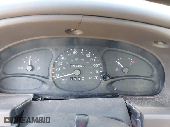 1999 Ford Escort SE z VIN 1FAFP13P5XW268897, wystawiony jako IAAI lot #42844258 z przebiegiem 169 050 mil mil oraz . Historia ofert i sprzedaży dostępna na DreamBid. Obrazek 7.