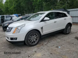 2015 Cadillac SRX Premium Collection z VIN 3GYFNDE35FS574644, wystawiony jako Copart lot #53949955 z przebiegiem 106 962 mil mil oraz Szkoda całkowita • Salvage title. Historia ofert i sprzedaży dostępna na DreamBid. Obrazek 1.
