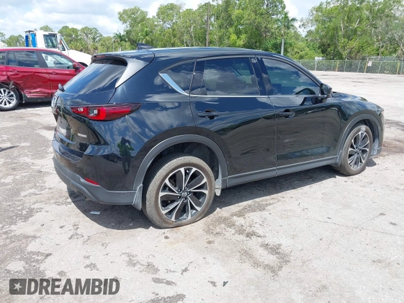 2023 Mazda CX-5 2.5 S Premium Plus Package with VIN JM3KFBEM5P0256652, listed as a IAAI auction lot 41936376 with 31,332 mi miles. Bid and sale history available at carsss.com. Image 4.