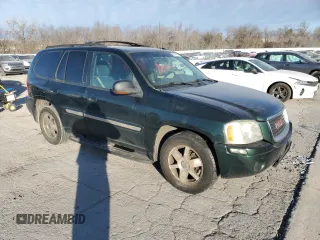 2004 GMC Envoy SLE with VIN 1GKDT13S142197514, listed as a Copart auction lot 89014465 with 202,790 mi miles and Salvage Title. Bid and sale history available at carsss.com. Image 4.