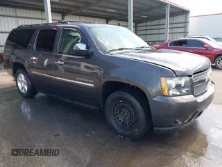 2010 Chevrolet Suburban LTZ with VIN 1GNUKKE37AR211159, listed as a IAAI auction lot 42528248 with 350,339 mi miles and . Bid and sale history available at DreamBid. Image 1.