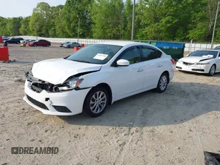 2017 Nissan Sentra S with VIN 3N1AB7AP3HY306536, listed as a IAAI auction lot 42041704 with 107,749 mi miles and . Bid and sale history available at DreamBid. Image 2.