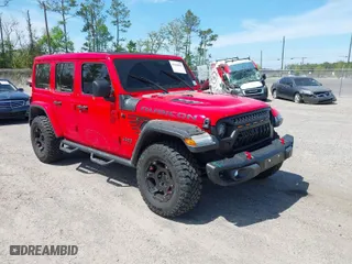 2020 Jeep Wrangler Unlimited Rubicon with VIN 1C4HJXFG9LW106607, listed as a IAAI auction lot 41908295 with 71,083 mi miles. Bid and sale history available at carsss.com. Image 1.