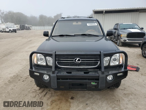 2001 Lexus LX 470 z VIN JTJHT00W513509447, wystawiony jako Copart lot #43988595 z przebiegiem 251 861 mil mil oraz Tytuł czysty. Historia ofert i sprzedaży dostępna na DreamBid. Obrazek 5.