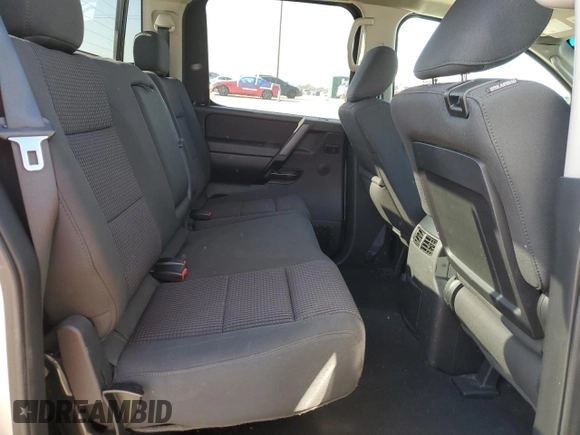 2010 Nissan Titan SE with VIN 1N6BA0ED4AN317007, listed as a Copart auction lot 42290495 with 130,724 mi miles and Salvage Title. Bid and sale history available at carsss.com. Image 10.