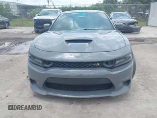 2019 Dodge Charger Scat Pack with VIN 2C3CDXGJ2KH633854, listed as a IAAI auction lot 42212517 with 74,285 mi miles and . Bid and sale history available at DreamBid. Image 6.