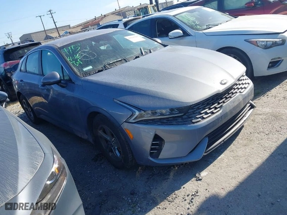 2021 Kia K5 LXS with VIN 5XXG14J27MG044519, listed as a IAAI auction lot 41816380 with 68,489 mi miles. Bid and sale history available at carsss.com. Image 1.