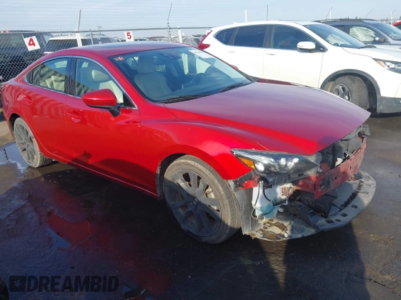 2016 Mazda 6 i Grand Touring with VIN JM1GJ1W57G1438524, listed as a IAAI auction lot 41365211 with 162,678 mi miles and . Bid and sale history available at DreamBid. Image 1.
