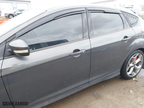 2015 Ford Focus ST with VIN 1FADP3L93FL321830, listed as a IAAI auction lot 41835529 with 106,901 mi miles. Bid and sale history available at carsss.com. Image 14.