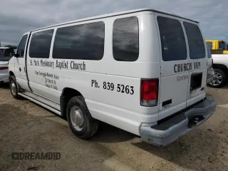 2000 Ford Econoline Passenger XL with VIN 1FBSS31L1YHB80264, listed as a Copart auction lot 74762814 with 61,702 mi miles and Salvage Title. Bid and sale history available at DreamBid. Image 2.