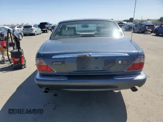 1998 Jaguar XJ with VIN SAJHX1247WC841374, listed as a Copart auction lot 51693595 with 109,509 mi miles and Clean Title. Bid and sale history available at DreamBid. Image 6.