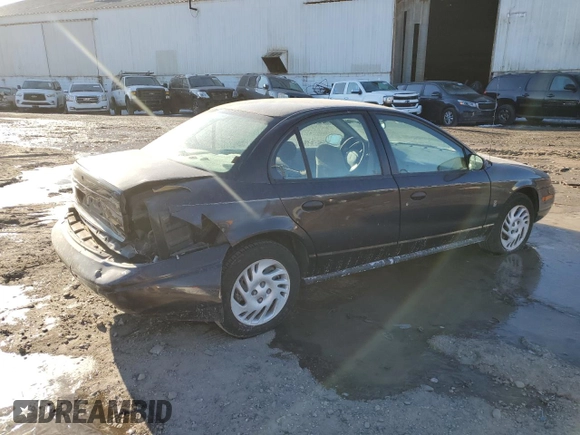 2000 Saturn SL with VIN 1G8ZH5283YZ169267, listed as a Copart auction lot 42626335 with 131,556 mi miles and Salvage Title. Bid and sale history available at carsss.com. Image 3.
