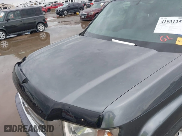 2014 Honda Ridgeline RTL with VIN 5FPYK1F50EB002577, listed as a IAAI auction lot 41931258 with 147,665 mi miles. Bid and sale history available at carsss.com. Image 6.