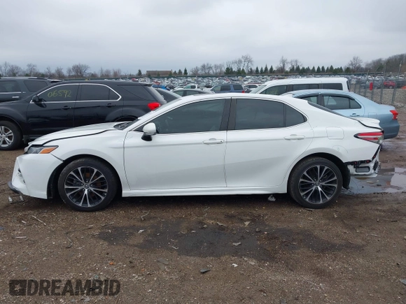 2019 Toyota Camry LE z VIN 4T1B11HK7KU687261, wystawiony jako IAAI lot #42016114 z przebiegiem 123 007 mil mil oraz . Historia ofert i sprzedaży dostępna na DreamBid. Obrazek 14.