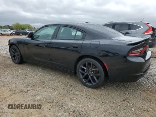 2021 Dodge Charger SXT with VIN 2C3CDXBG6MH613055, listed as a Copart auction lot 52149655 with 86,396 mi miles and Salvage Title. Bid and sale history available at carsss.com. Image 2.