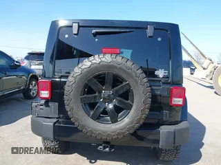2014 Jeep Wrangler Unlimited Sahara with VIN 1C4BJWEG0EL306202, listed as a IAAI auction lot 41784330 with 79,123 mi miles. Bid and sale history available at carsss.com. Image 16.