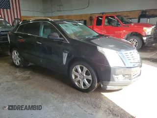 2014 Cadillac SRX Performance Collection z VIN 3GYFNFE31ES627978, wystawiony jako Copart lot #55437185 z przebiegiem 141 759 mil mil oraz Czysty tytuł • Clean title. Historia ofert i sprzedaży dostępna na DreamBid. Obrazek 4.