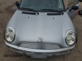 2004 MINI Hardtop with VIN WMWRC33424TJ63121, listed as a Copart auction lot 45724105 with 215,449 mi miles and Salvage Title. Bid and sale history available at DreamBid. Image 12.