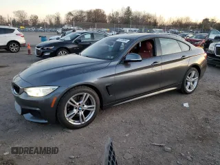 2015 BMW 4 Series 428i xDrive with VIN WBA4C9C5XFD330974, listed as a Copart auction lot 80738054 with 130,644 mi miles and Salvage title. Bid and sale history available at DreamBid. Image 1.