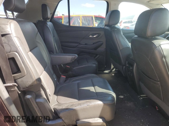 2018 Chevrolet Traverse Premier z VIN 1GNERKKW3JJ127918, wystawiony jako Copart lot #55438525 z przebiegiem 134 336 mil mil oraz Szkoda całkowita • Salvage title. Historia ofert i sprzedaży dostępna na DreamBid. Obrazek 11.