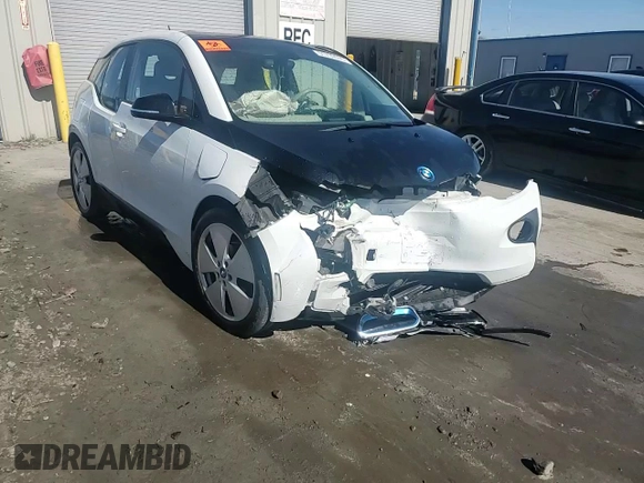 2015 BMW i3 z VIN WBY1Z4C51FV502745, wystawiony jako Copart lot #51739575 z przebiegiem Nie podano mil oraz Szkoda całkowita • Salvage title. Historia ofert i sprzedaży dostępna na DreamBid. Obrazek 14.
