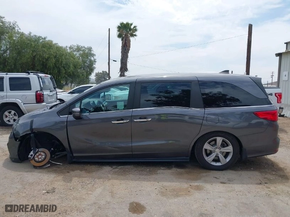 2018 Honda Odyssey EX-L with VIN 5FNRL6H76JB108175, listed as a IAAI auction lot 42031001 with 111,205 mi miles. Bid and sale history available at carsss.com. Image 14.