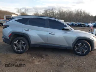 2022 Hyundai Tucson SEL with VIN 5NMJFCAE4NH060031, listed as a IAAI auction lot 41451874 with 57,228 mi miles and . Bid and sale history available at carsss.com. Image 13.