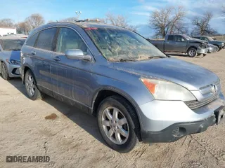 2009 Honda CR-V EX-L with VIN 5J6RE48749L028732, listed as a IAAI auction lot 41884092 with 164,402 mi miles. Bid and sale history available at carsss.com. Image 1.