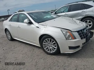 2012 Cadillac CTS Luxury with VIN 1G6DF5E55C0127450, listed as a IAAI auction lot 42020764 with 150,597 mi miles and . Bid and sale history available at DreamBid. Image 1.