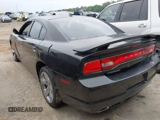 2011 Dodge Charger SE with VIN 2B3CL3CG3BH512706, listed as a IAAI auction lot 42122199 with 181,258 mi miles and . Bid and sale history available at carsss.com. Image 3.