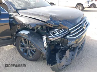 2024 Volkswagen Tiguan SE z VIN 3VV3B7AX8RM192033, wystawiony jako IAAI lot #41568271 z przebiegiem 2 851 mil mil oraz . Historia ofert i sprzedaży dostępna na DreamBid. Obrazek 6.