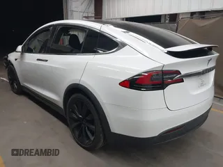 2020 Tesla Model X Long Range with VIN 5YJXCDE22LF305223, listed as a IAAI auction lot 41989862 with 48,309 mi miles. Bid and sale history available at carsss.com. Image 3.