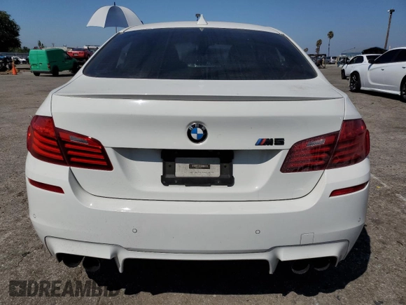 2014 BMW M5 with VIN WBSFV9C57ED097570, listed as a Copart auction lot 69757854 with 0 mi miles and Salvage Title. Bid and sale history available at carsss.com. Image 6.