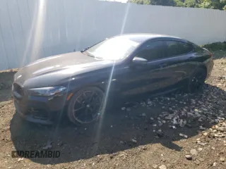 2023 BMW 8 Series M850i with VIN WBAGV8C09PCK80498, listed as a Copart auction lot 59668124 with 44,527 mi miles and Salvage Title. Bid and sale history available at carsss.com. Image 1.