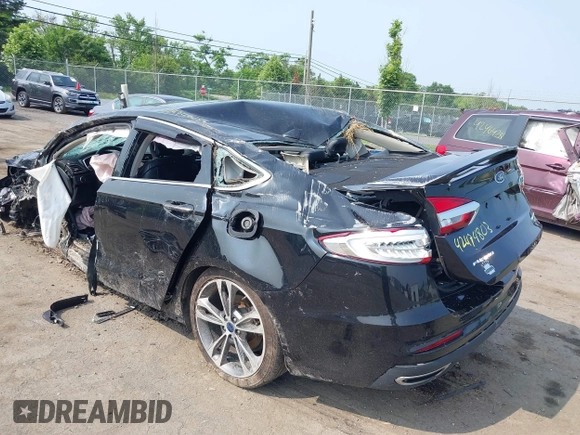2019 Ford Fusion Titanium with VIN 3FA6P0D92KR247270, listed as a IAAI auction lot 42474803 with Not provided miles and . Bid and sale history available at DreamBid. Image 3.