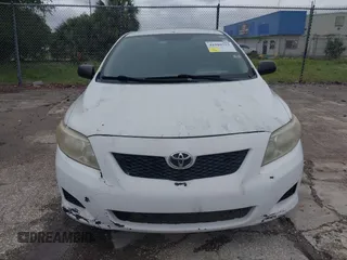 2010 Toyota Corolla with VIN JTDBU4EEXAJ085269, listed as a IAAI auction lot 41989533 with 141,564 mi miles. Bid and sale history available at carsss.com. Image 6.