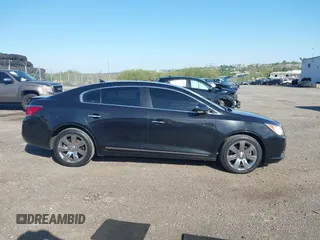 2012 Buick LaCrosse Premium 1 z VIN 1G4GD5E35CF282278, wystawiony jako IAAI lot #42146380 z przebiegiem 92 968 mil mil oraz . Historia ofert i sprzedaży dostępna na DreamBid. Obrazek 13.
